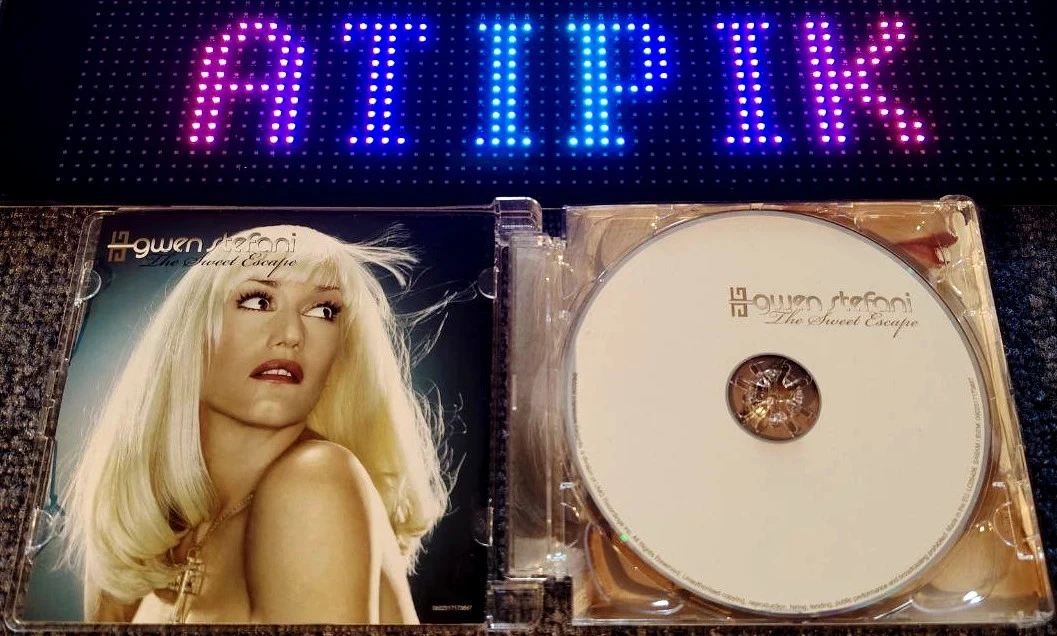 🌟 The Sweet Escape de Gwen Stefani – A joia pop dos anos 2000 que você precisa ter! 💿 – photo 3
